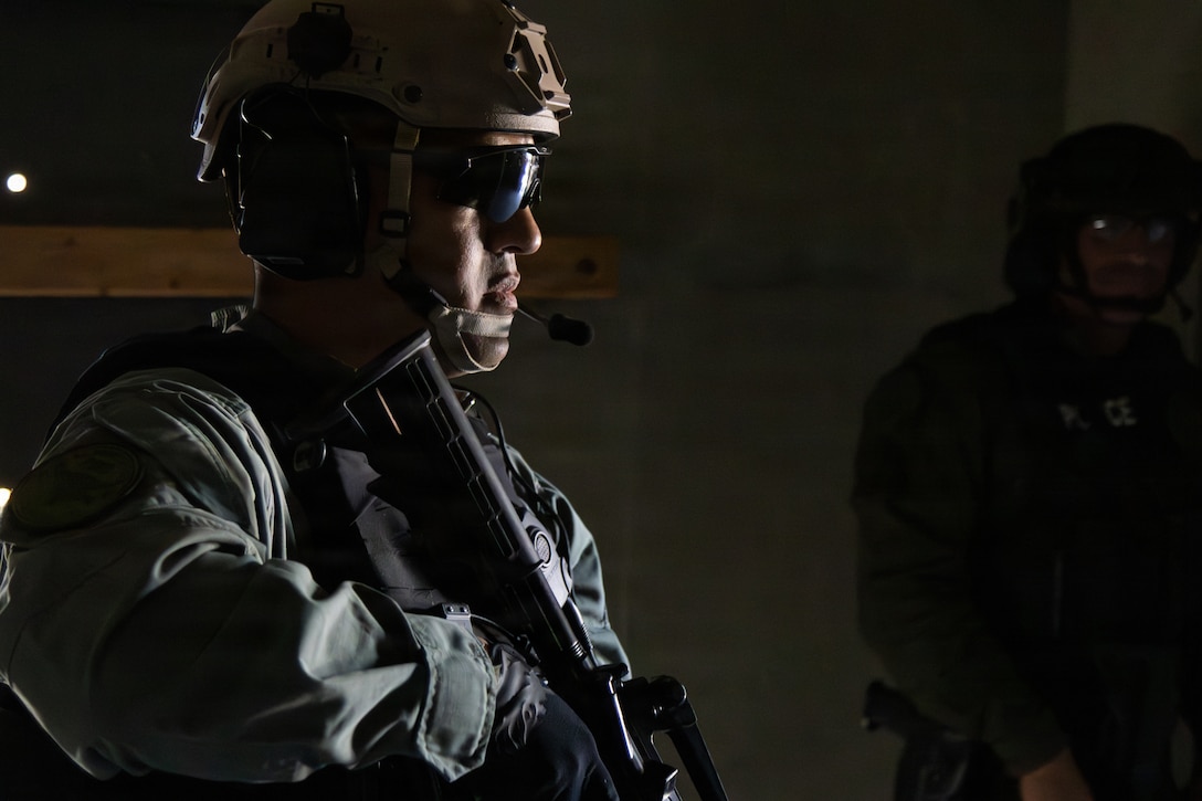Barstow Police Department officers and MCLB Barstow Special Response Team members conduct hostage response training at the Shoot House training facility aboard Marine Corps Logistics Base  Barstow, California on June 26th. The joint exercise strengthened the Special Response Team’s coordination, communication, and tactical readiness to prepare personnel for high-risk emergency situations.