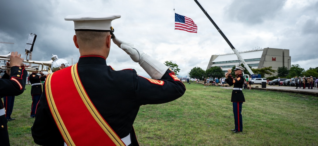 NORFOLK, Va. (June 19, 2026) Staff Sgt. Christopher L. Miller, assigned to the 2nd Marine Aircraft Wing (MAW) Band, salutes during the national anthem at the Norfolk Harborfest Parade of Sail, June 19, 2026. FLEETEX 250 represents the United States’ commitment to layer defense of the homeland through forward-deployed forces and reinforces interoperability with allies and partners through collective maritime security. (U.S. Navy photo by Mass Communication Specialist 2nd Class Derek Cole)