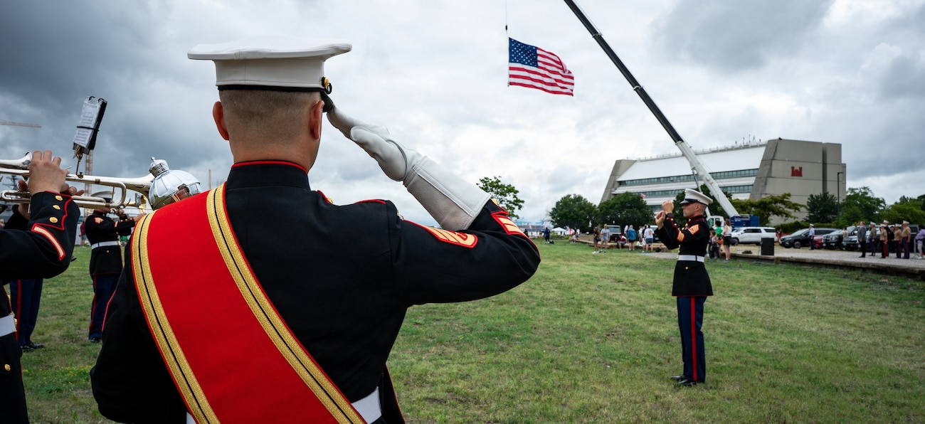NORFOLK, Va. (June 19, 2026) Staff Sgt. Christopher L. Miller, assigned to the 2nd Marine Aircraft Wing (MAW) Band, salutes during the national anthem at the Norfolk Harborfest Parade of Sail, June 19, 2026. FLEETEX 250 represents the United States’ commitment to layer defense of the homeland through forward-deployed forces and reinforces interoperability with allies and partners through collective maritime security. (U.S. Navy photo by Mass Communication Specialist 2nd Class Derek Cole)