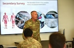 Col. John Osborn, staff physician and instructor, guides members of the healthcare team through the first-of-its-kind Trauma Evaluation and Management (TEAM) course at Womack Army Medical Center, Fort Bragg, North Carolina.