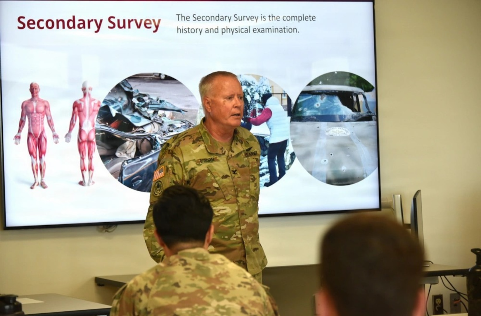 Col. John Osborn, staff physician and instructor, guides members of the healthcare team through the first-of-its-kind Trauma Evaluation and Management (TEAM) course at Womack Army Medical Center, Fort Bragg, North Carolina.