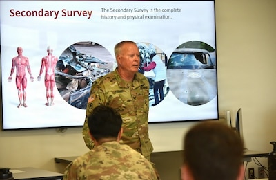 Col. John Osborn, staff physician and instructor, guides members of the healthcare team through the first-of-its-kind Trauma Evaluation and Management (TEAM) course at Womack Army Medical Center, Fort Bragg, North Carolina.
