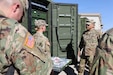 Army Materiel Command Command Sgt. Maj. Jacinto Garza visits a supply support activity at Fort Hood, Texas.