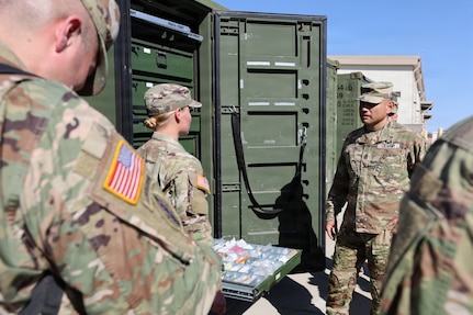 Army Materiel Command Command Sgt. Maj. Jacinto Garza visits a supply support activity at Fort Hood, Texas.
