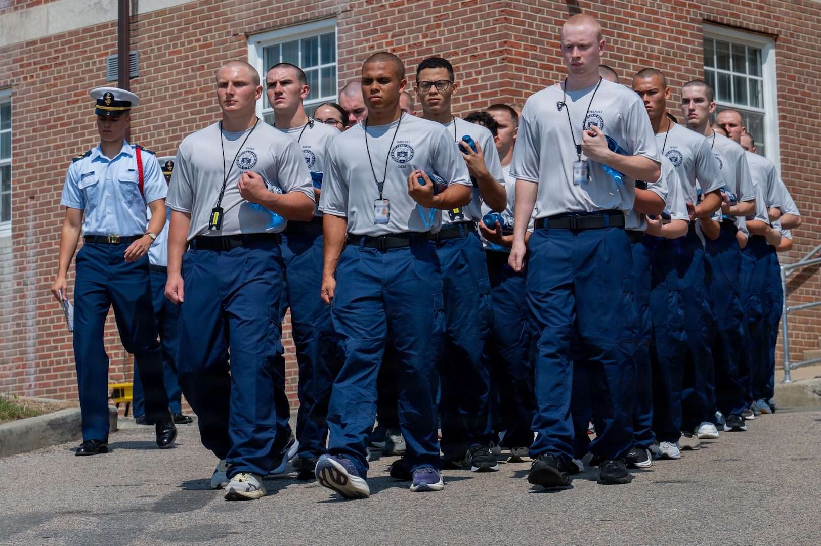 U.S. Coast Guard Academy (USCGA) Class of 2030 swabs transit to their next check-in station at USCGA, New London, Connecticut, June 29, 2026. Day One marks the start of Swab Summer, an intensive seven-week program that prepares students for military and Academy life.(U.S. Coast Guard photo by Petty Officer Third Class Roxanna Jacobo Cruz)
