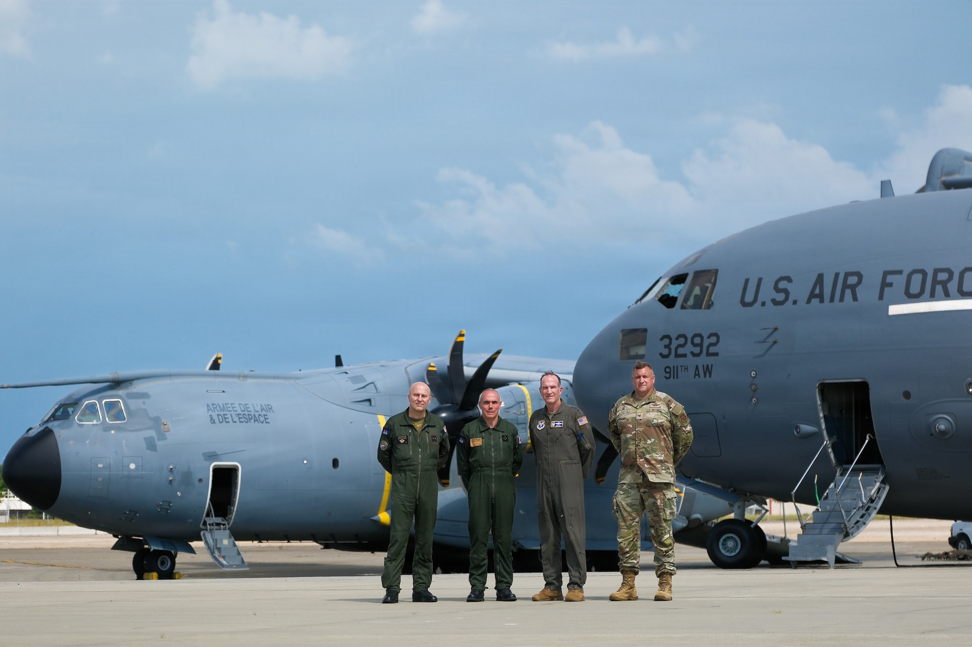 Lt. Gen. Dominique Tardif, vice chief of the French Air and Space Force U.S. Air Force, Brig. Gen. Nicolas Chambaz, International Relations general officer of the FASF HQ, Lt. Gen. John Healy, chief of Air Force Reserve and commander, Air Force Reserve Command, and Col. Douglas Stouffer, commander of the 911th Airlift Wing, stand in front of a C-17 Globemaster III