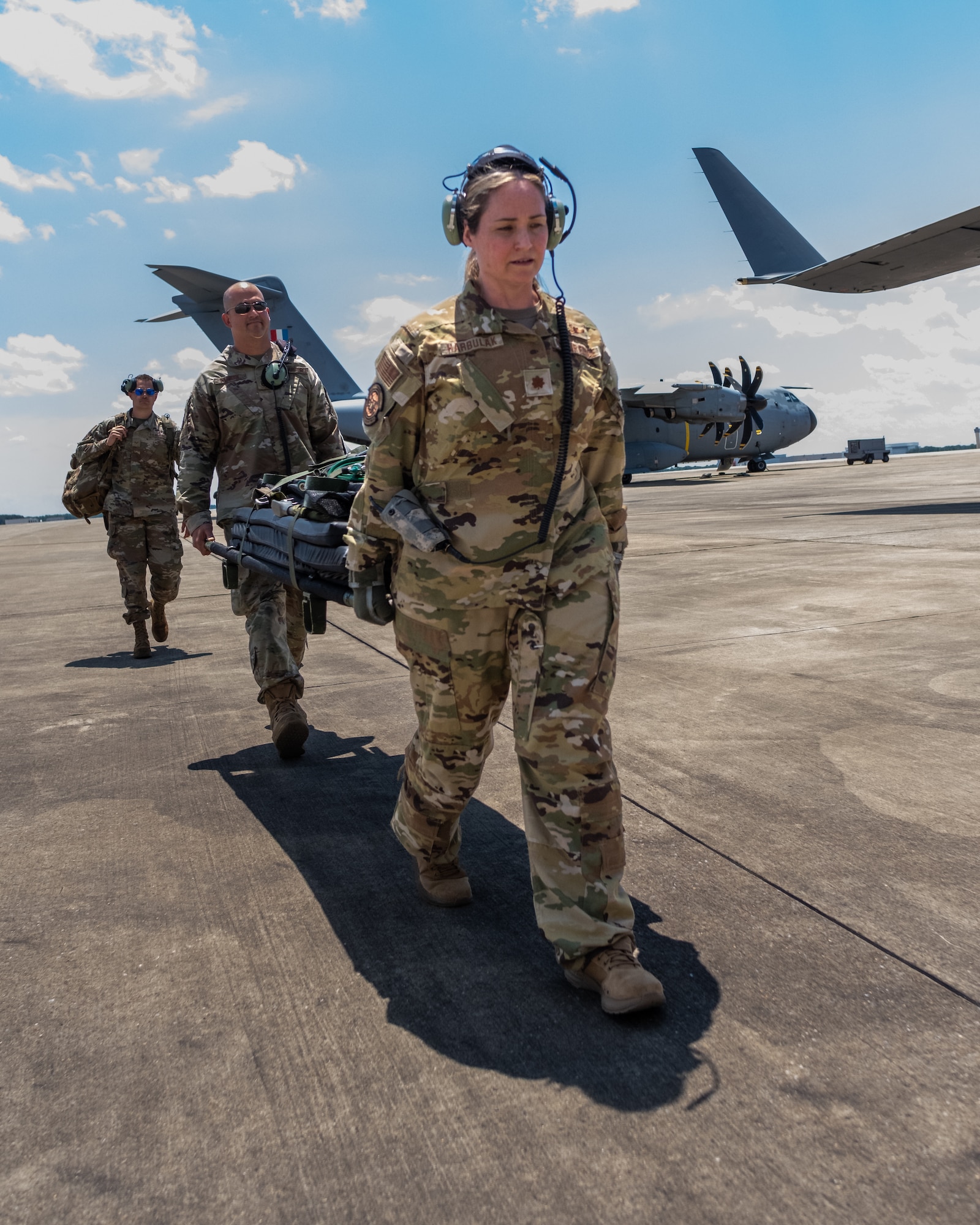 U.S. Airmen from the 911th Aeromedical Evacuation Squadron, transport a simulated patient