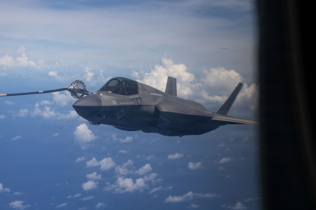 A Marine Corps KC-130J Super Hercules aircraft refuels an F-35B Lightning II aircraft  in support of Valiant Shield 2026 over the Pacific Ocean, June 25, 2026.