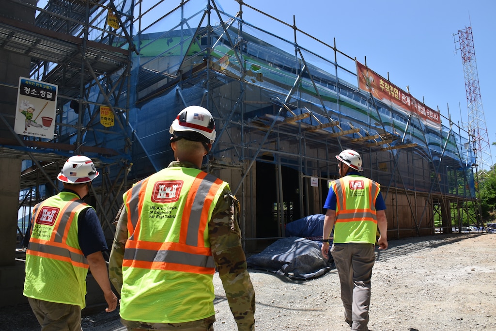 The new Water Treatment Plant rises above the surrounding terrain during construction at Chinhae Naval Base, South Korea, June 7, 2025. Built on higher ground than the previous facility, the modernized plant enhances flood protection, improves force protection compliance, and strengthens water security for the installation's residents. The facility is scheduled for official turnover to the U.S. Navy by late June 2026. (U.S. Army photo by Rachel Napolitan)