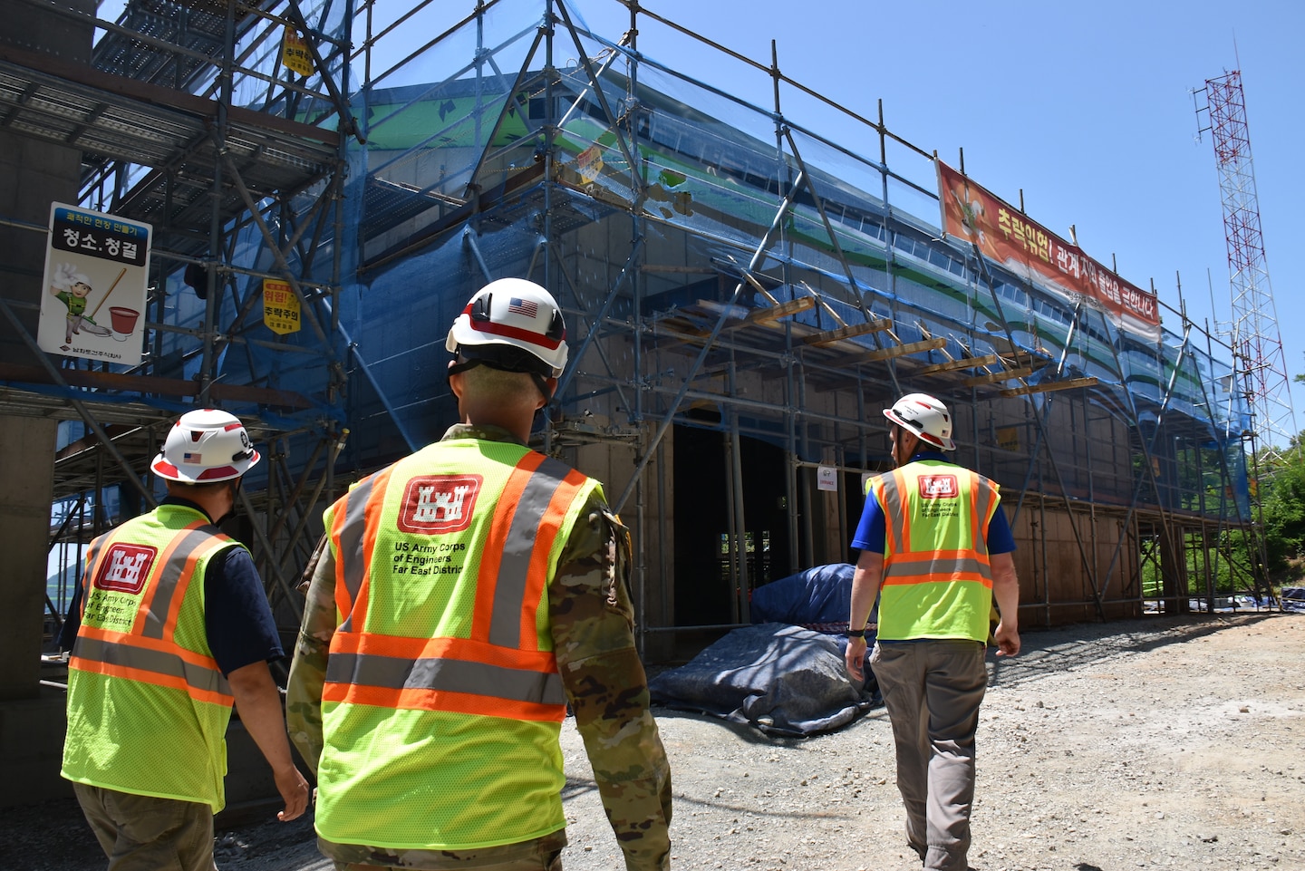 The new Water Treatment Plant rises above the surrounding terrain during construction at Chinhae Naval Base, South Korea, June 7, 2025. Built on higher ground than the previous facility, the modernized plant enhances flood protection, improves force protection compliance, and strengthens water security for the installation's residents. The facility is scheduled for official turnover to the U.S. Navy by late June 2026. (U.S. Army photo by Rachel Napolitan)