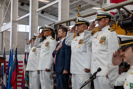 NAVAL AIR STATION NORTH ISLAND, Calif. (June 26, 2026) Official party members render a salute during the change of command ceremony for Undersea Rescue Command (URC) onboard Naval Air Station North Island, June 26, 2026. During the ceremony, Cmdr. Christian Rivera was relieved by Cmdr. Michael Mowry as commanding officer of URC.  URC, comprised of active and Reserve component Sailors, and civilian contractors, is the Navy’s only submarine rescue-capable command ready to deploy around the world in the event of a submarine emergency. (U.S. Navy photo by Mass Communication Specialist 2nd Class Rashan Jefferson)
