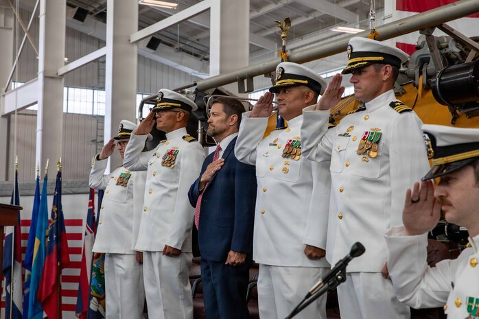 NAVAL AIR STATION NORTH ISLAND, Calif. (June 26, 2026) Official party members render a salute during the change of command ceremony for Undersea Rescue Command (URC) onboard Naval Air Station North Island, June 26, 2026. During the ceremony, Cmdr. Christian Rivera was relieved by Cmdr. Michael Mowry as commanding officer of URC.  URC, comprised of active and Reserve component Sailors, and civilian contractors, is the Navy’s only submarine rescue-capable command ready to deploy around the world in the event of a submarine emergency. (U.S. Navy photo by Mass Communication Specialist 2nd Class Rashan Jefferson)