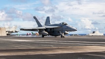 An F/A-18 Super Hornet, assigned to Strike Fighter Squadron (VFA) 195, launches off the flight deck of Nimitz-class carrier USS George Washington (CVN 73) in support of a live-fire sinking exercise (SINKEX) as part of Valiant Shield 2026 while underway in the Philippine Sea, June 27, 202