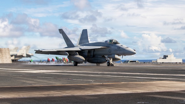An F/A-18 Super Hornet, assigned to Strike Fighter Squadron (VFA) 195, launches off the flight deck of Nimitz-class carrier USS George Washington (CVN 73) in support of a live-fire sinking exercise (SINKEX) as part of Valiant Shield 2026 while underway in the Philippine Sea, June 27, 202