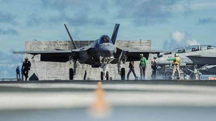 An F-35C Lightning II, attached to Strike Fighter Squadron (VFA) 147, readies for takeoff on the flight deck of Nimitz-class aircraft carrier USS George Washington (CVN 73) in support of a live-fire sinking exercise (SINKEX) as part of Valiant Shield 2026 while underway in the Philippine Sea, June 27, 2026.