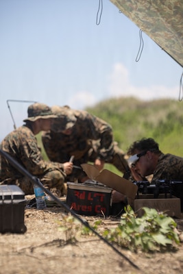 U.S. Marines with 3rd Littoral Combat Team, 3rd Marine Littoral Regiment, 3rd Marine Division, operate an unmanned aerial system from a field-expedient control position during a Neros Archer live-fire range as part of KAMANDAG 10 at