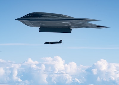 A stealth bomber fires a cruise missile