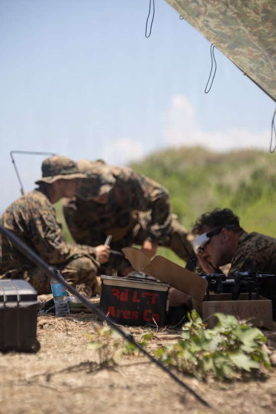 U.S. Marines with 3rd Littoral Combat Team, 3rd Marine Littoral Regiment, 3rd Marine Division, operate an unmanned aerial system from a field-expedient control position during a Neros Archer live-fire range as part of KAMANDAG 10 at Fort Magsaysay, Nueva Ecija, Philippines, June 15, 2026. The live-fire event enabled U.S. Marines and Philippine Marine Corps personnel to integrate unmanned aerial systems, communications and reconnaissance capabilities in a realistic operational environment.

KAMANDAG 10 is a multi-domain, joint, and combined exercise between the Armed Forces of the Philippines and United States military focused on enhancing maritime security, interoperability, contested logistics, and combined readiness throughout the Philippine archipelago. (U.S. Marine Corps photo by Staff Sgt. Ryan Hageali)