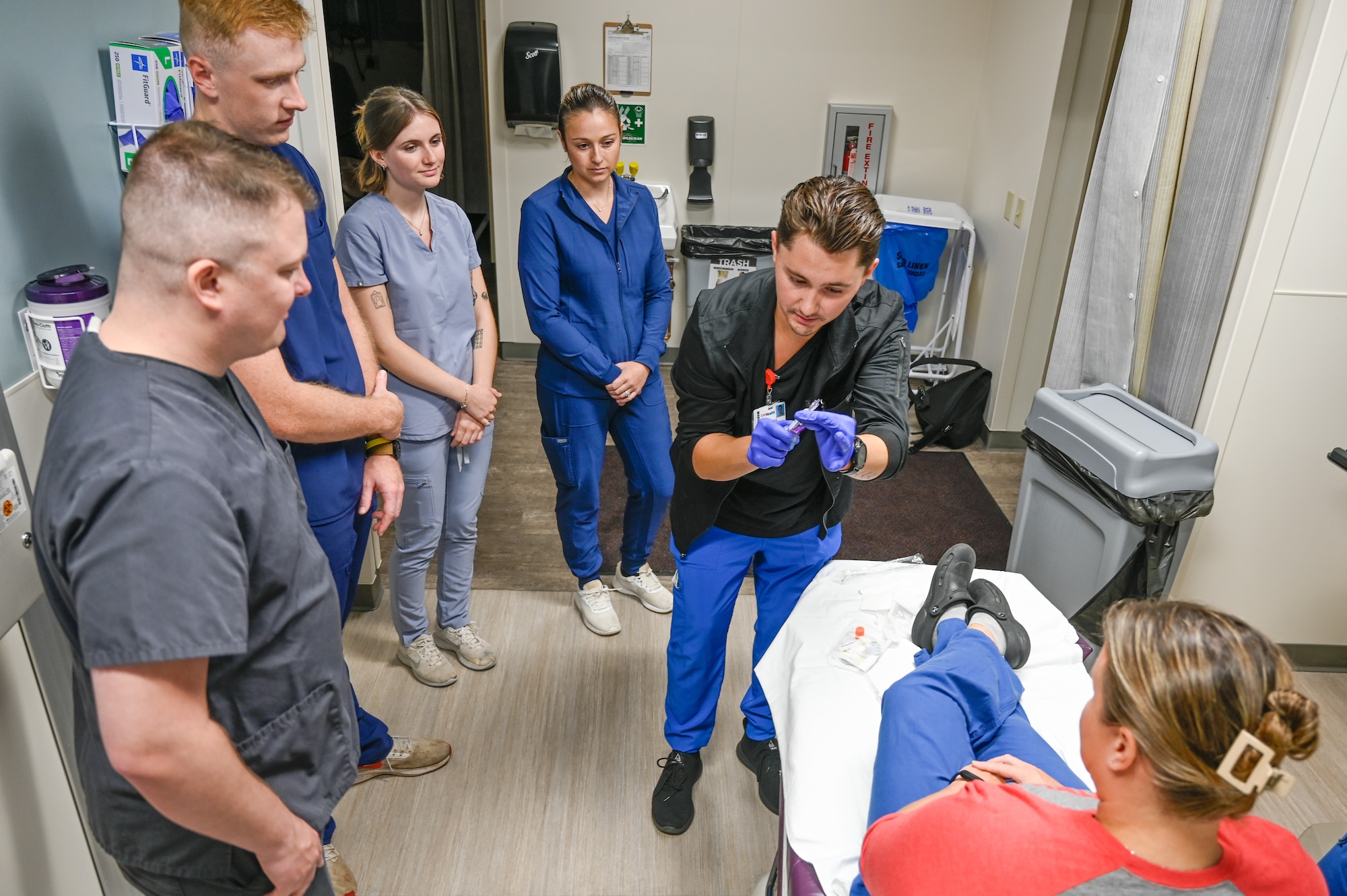 U.S. Airmen with the Wisconsin Air National Guard's 115th Medical Group work with UW Health hospital staff in Madison, Wisconsin, Sept. 13, 2025 as part of their training affiliation agreement. It was the first day of the program, where the Airmen began by observing in the emergency department, burn unit or the trauma lifecare unit. (U.S. Air National Guard photo by Senior Airman Jessica Duch)