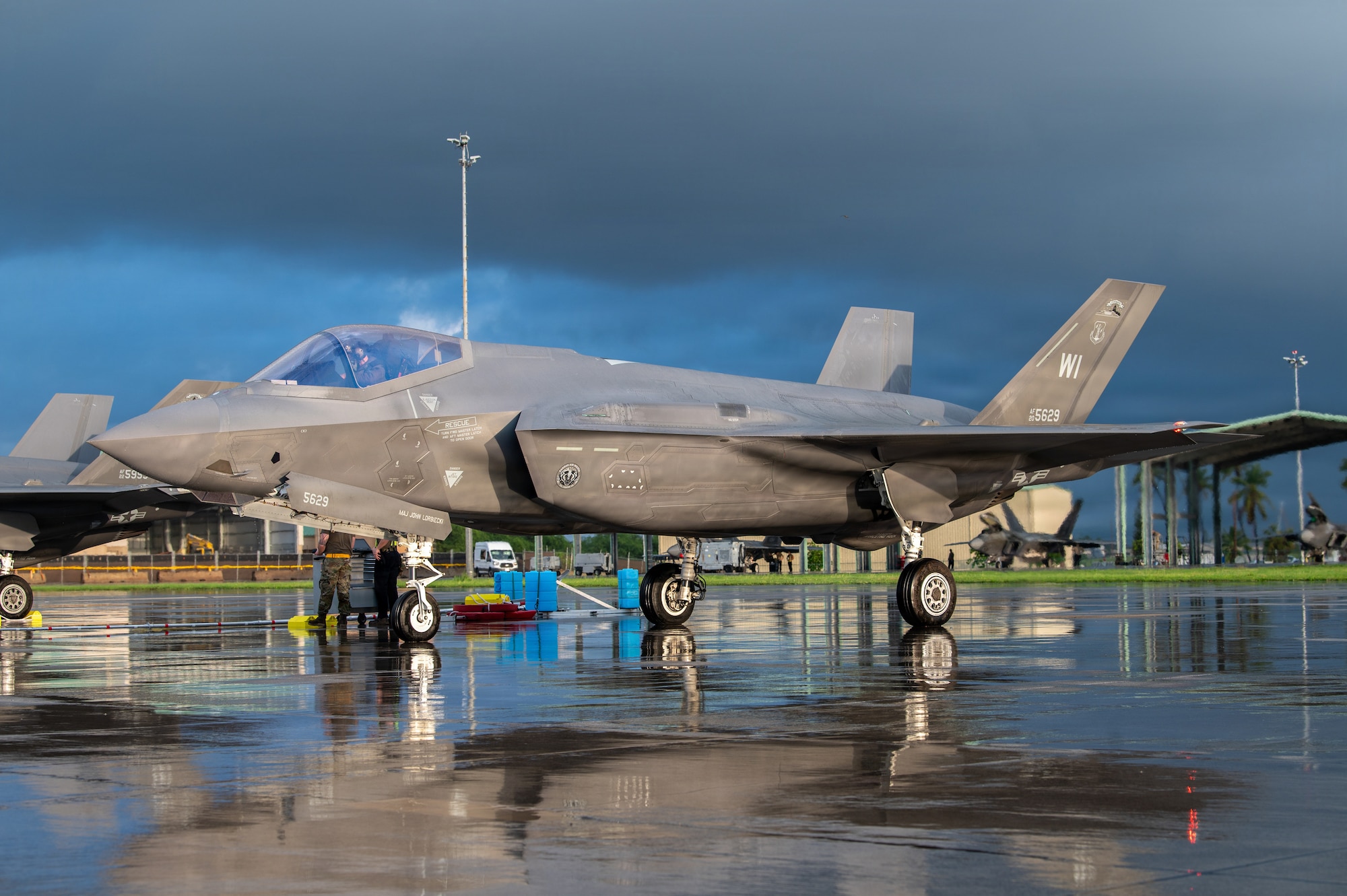 A U.S. Air Force F-35A Lightning II aircraft assigned to the 115th Fighter Wing, Wisconsin Air National Guard, sits on a ramp during exercise Sentry Aloha 26-1 at Joint Base Pearl Harbor-Hickam, Hawaii, Jan. 14, 2026. Sentry Aloha is built around Dissimilar Air Combat Training, which challenges pilots to engage in combat scenarios against aircraft with different performance capabilities. (U.S. Air National Guard photo by Master Sgt. Mary Greenwood)