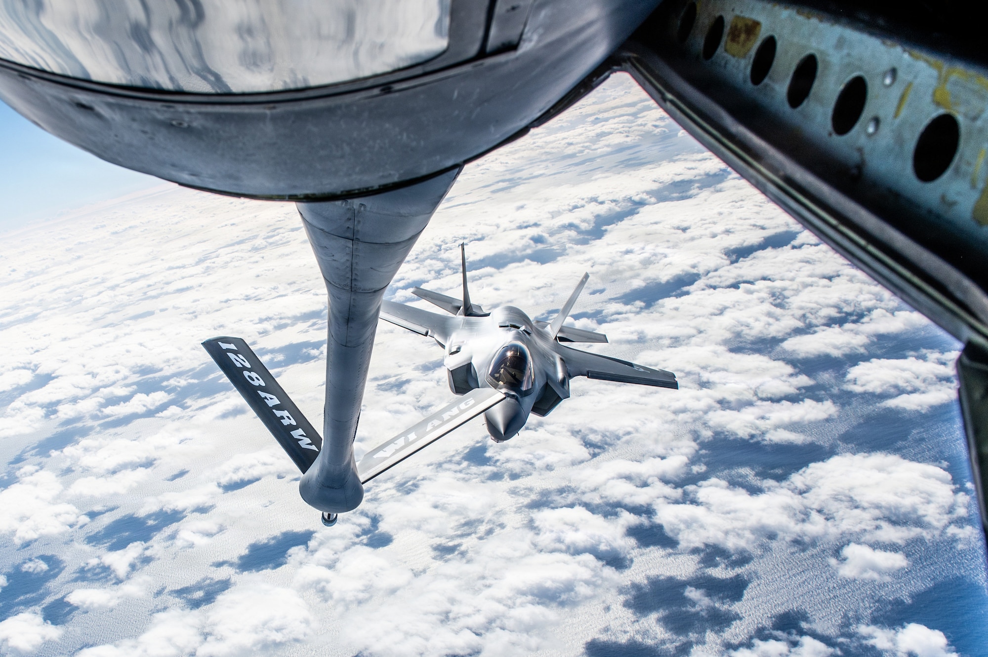 A U.S. Air Force F-35A Lightning II aircraft assigned to the 115th Fighter Wing, Wisconsin Air National Guard, prepares for in-flight refueling during exercise Sentry Aloha 26-1, over the Pacific Ocean, Jan. 20, 2026. Sentry Aloha is built around Dissimilar Air Combat Training, which challenges pilots to engage in combat scenarios against aircraft with different performance capabilities. (U.S. Air National Guard photo by Master Sgt. Mary Greenwood)