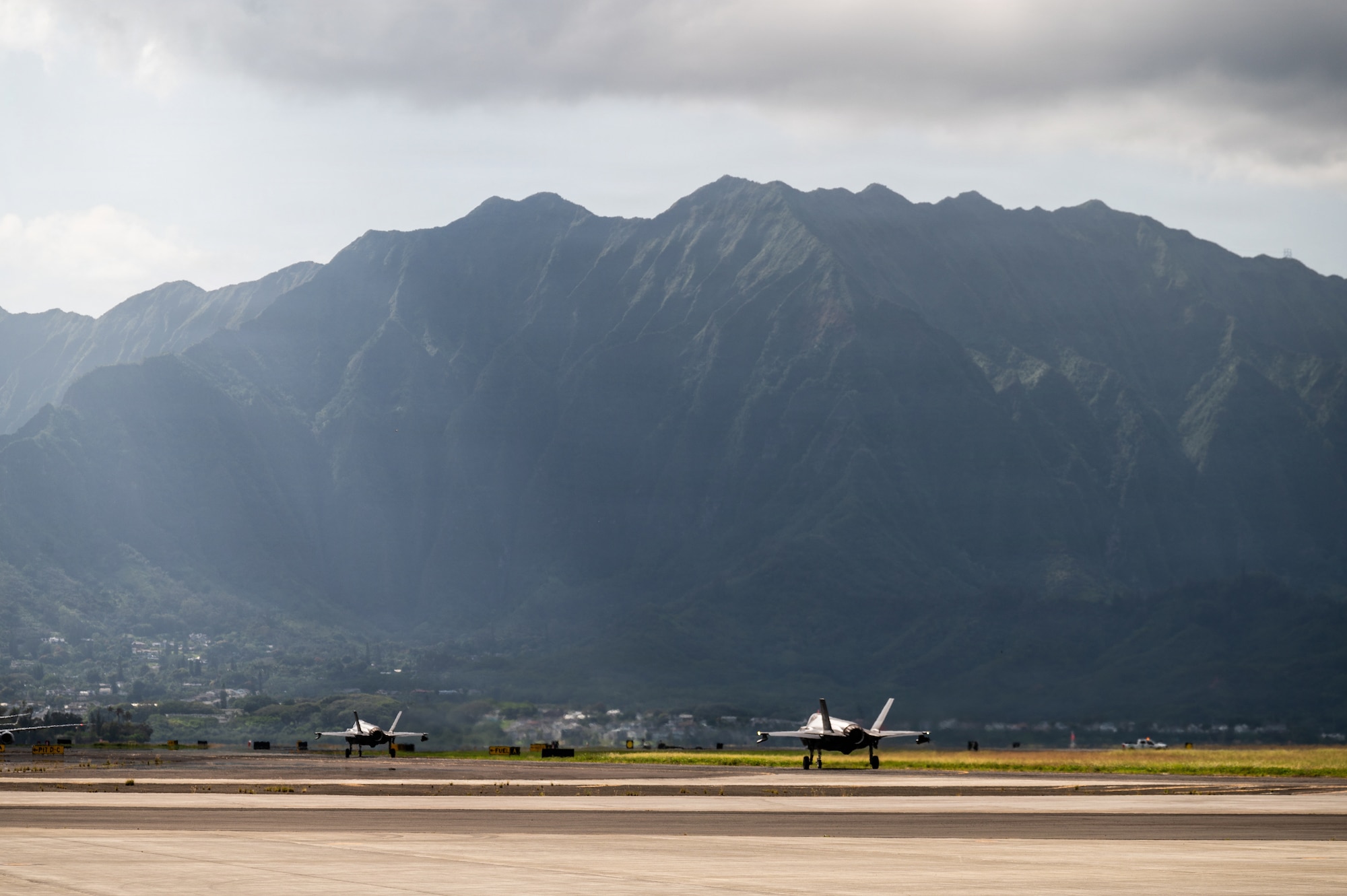 U.S. Air Force F-35A Lightning II aircraft assigned to the 115th Fighter Wing, Wisconsin Air National Guard, taxi for take off during exercise Sentry Aloha 26-1 at Kaneohe Bay, Hawaii, Jan. 20, 2026. Sentry Aloha is built around Dissimilar Air Combat Training, which challenges pilots to engage in combat scenarios against aircraft with different performance capabilities. (U.S. Air National Guard photo by Master Sgt. Mary Greenwood)