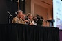 U.S. Air Force Lt. Gen. Jason Armagost, left, deputy commander of Air Force Global Strike Command, participates in a discussion panel during the 27th annual Nuclear Triad Symposium