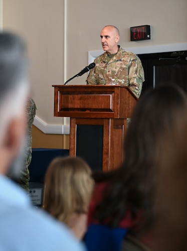 Col. Brian Viola speaks to all in attendance during Kessel Run’s change of leadership ceremony at the Minuteman Commons, here, June 25. During the ceremony, Viola assumed the role as Kessel Run’s senior materiel leader. Kessel Run is a division focused on delivering resilient command and control and targeting software capabilities that provide operators with decision advantage. (Official Air Force photo by Morgan Brown).