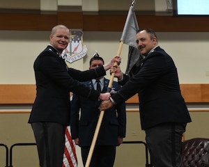 U.S. Space Force Maj. Eric Pendleton, right, accepts command of the 22nd Space Operations Squadron, Detachment 1, June 26, 2026.