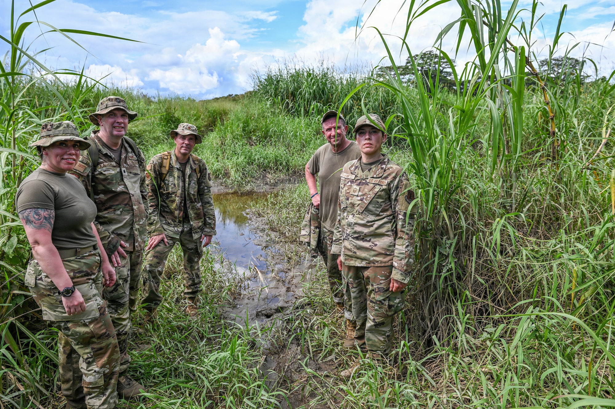 U.S. Airmen assigned to the Wisconsin Air National Guard, retrace the steps the 32nd Division took during their march across New Guinea on the Gaba Gaba trail, National Capital District, Papua New Guinea, March 17, 2025. The Wisconsin National Guard traveled to PNG as part of the State Partnership Program subject matter expert exchange. (U.S. Air National Guard photo by Master Sgt. Mary Greenwood)