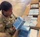 Spc. Ahmoni Lamar, an automated logistical specialist with Alpha Company, 129th Division Sustainment Support Battalion, 101st Division Sustainment Brigade, 101st Airborne (Air Assault) Division, pulls medical supplies to prepare an order for shipment from the Supply Support Activity at Fort Campbell, Kentucky. (U.S. Army photo by Chief Warrant Officer 2 Kiptiatu Koroma)