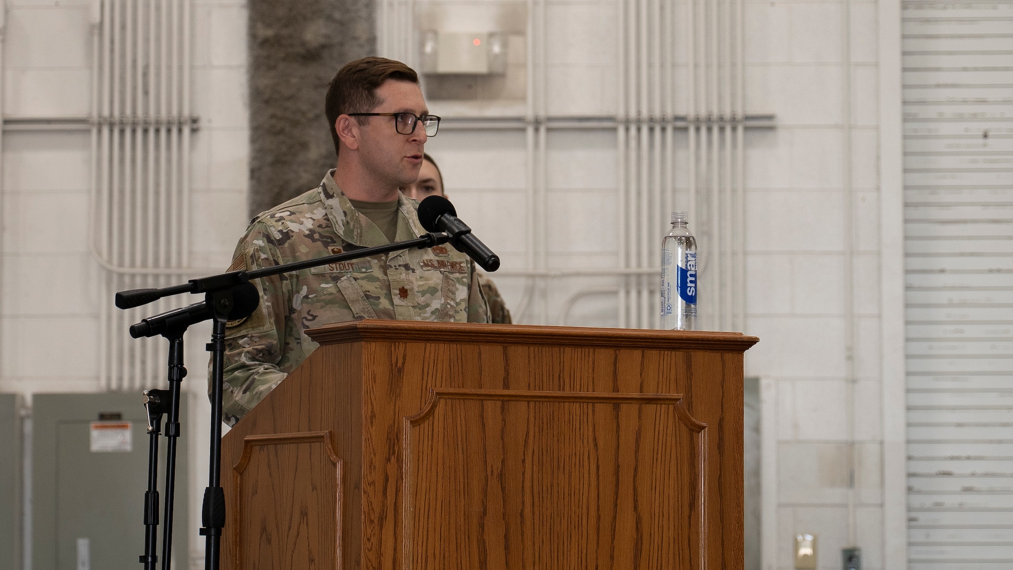 Incoming commander talks to crowd at change of command ceremony.