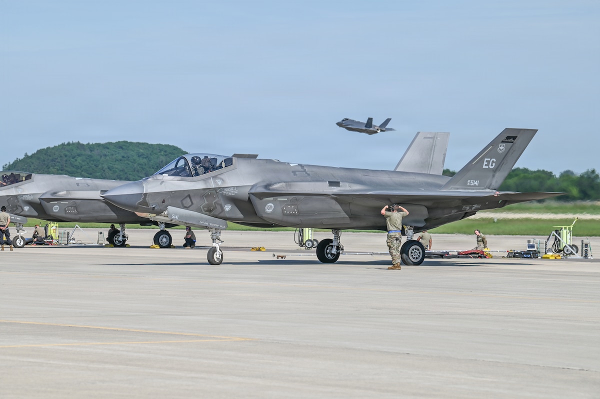A U.S. Air Force tactical aircraft maintenance specialist assigned to the 33rd Fighter Wing, Florida Air National Guard, marshals an F-35A Lightning II aircraft for launch during Sentry North 2026 at Volk Field Combat Readiness Training Center, Camp Douglas, Wisconsin, June 4, 2026. Sentry North 2026 is a joint total force exercise led by the National Guard Bureau Readiness Training Program and hosted by Volk Field Combat Readiness Training Center and Alpena Combat Readiness Training Center. (U.S. Air National Guard photo by Master Sgt. Mary Greenwood)