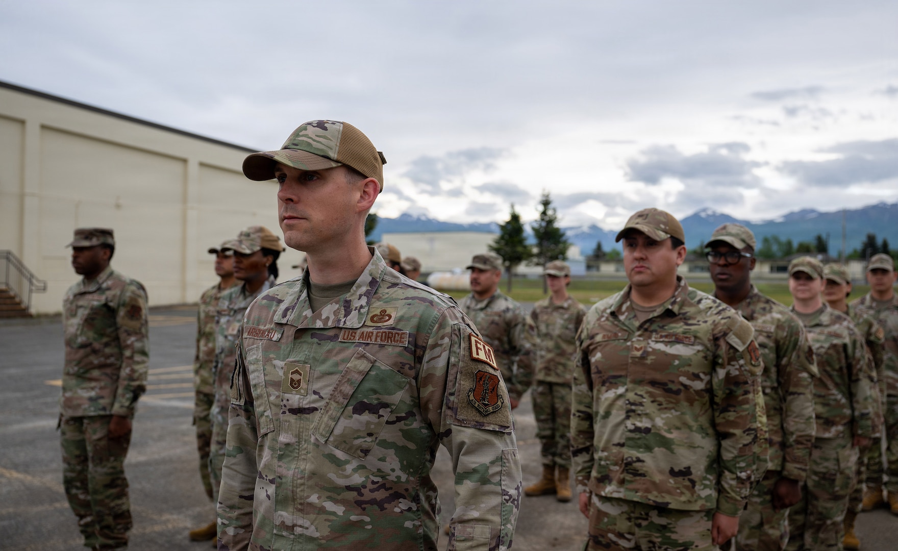 U.S. Financial Management Airman participate in an open ranks inspection during Exercise Arctic Ledger at Joint Base Elmendorf-Richardson, Alaska, June 13, 2026