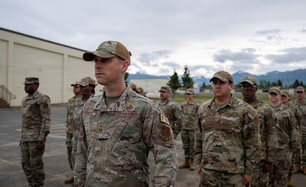 U.S. Financial Management Airman participate in an open ranks inspection during Exercise Arctic Ledger at Joint Base Elmendorf-Richardson, Alaska, June 13, 2026