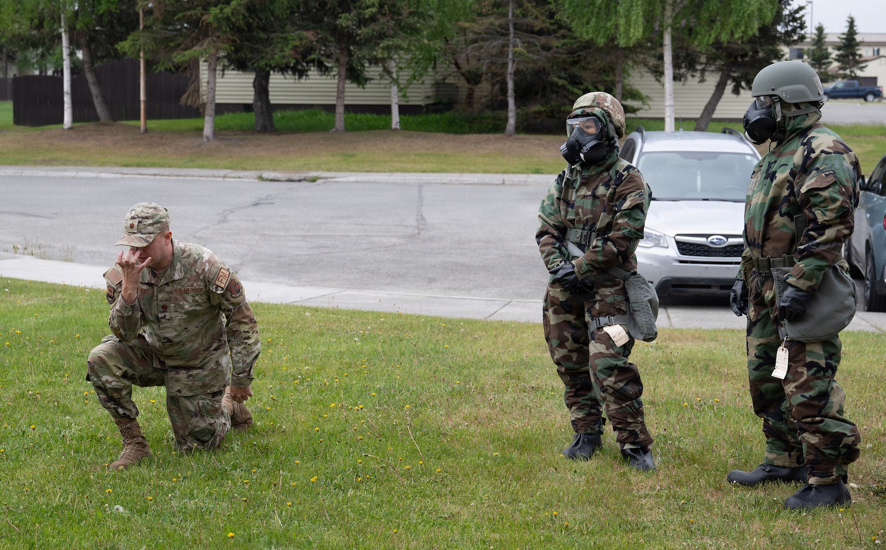 U.S Air Force Maj. Ryan Armes, commander and comptroller, 165th Comptroller Flight, Georgia Air National Guard, briefs comptroller Airmen after a simulated attack during Exercise Arctic Ledger at Joint Base Elmendorf-Richardson, Alaska, June 11, 2026.