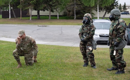 U.S Air Force Maj. Ryan Armes, commander and comptroller, 165th Comptroller Flight, Georgia Air National Guard, briefs comptroller Airmen after a simulated attack during Exercise Arctic Ledger at Joint Base Elmendorf-Richardson, Alaska, June 11, 2026.