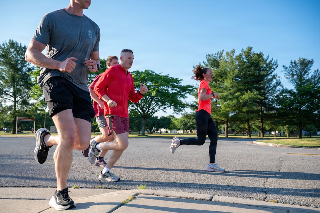 U.S. Airmen assigned to the 316th Civil Engineer Squadron participate in a unit 5K