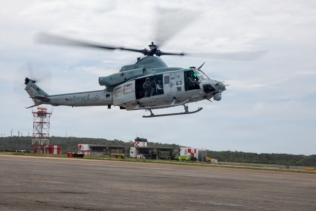 A U.S. Marine Corps UH-1Y Venom assigned to Marine Medium Tiltrotor Squadron (VMM) 365 (Reinforced), Littoral Combat Force-24, prepares to land during an aerial damage assessment flight, at Simón Bolívar International Airport, Caracas, Venezuela, June 28, 2026. At the direction of U.S. Southern Command, assigned U.S. military forces are supporting Department of State-led U.S. disaster assistance to the people of Venezuela in the aftermath of the June 24, 2026, earthquakes. (U.S. Marine Corps photo)