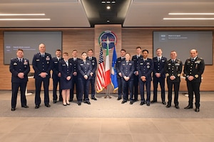 U.S. and Italian air force senior leaders stand with 10 newly graduated U.S. Air Force pilots at the International Flight Training School (IFTS) at Decimomannu Air Base, Italy, Jan. 16, 2026.