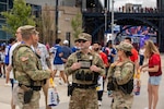 Soldiers from the 972nd Military Police Company and 211th Military Police Battalion, Massachusetts National Guard, provide security at an entrance area at Boston Stadium before a FIFA World Cup game, June 26, 2026.