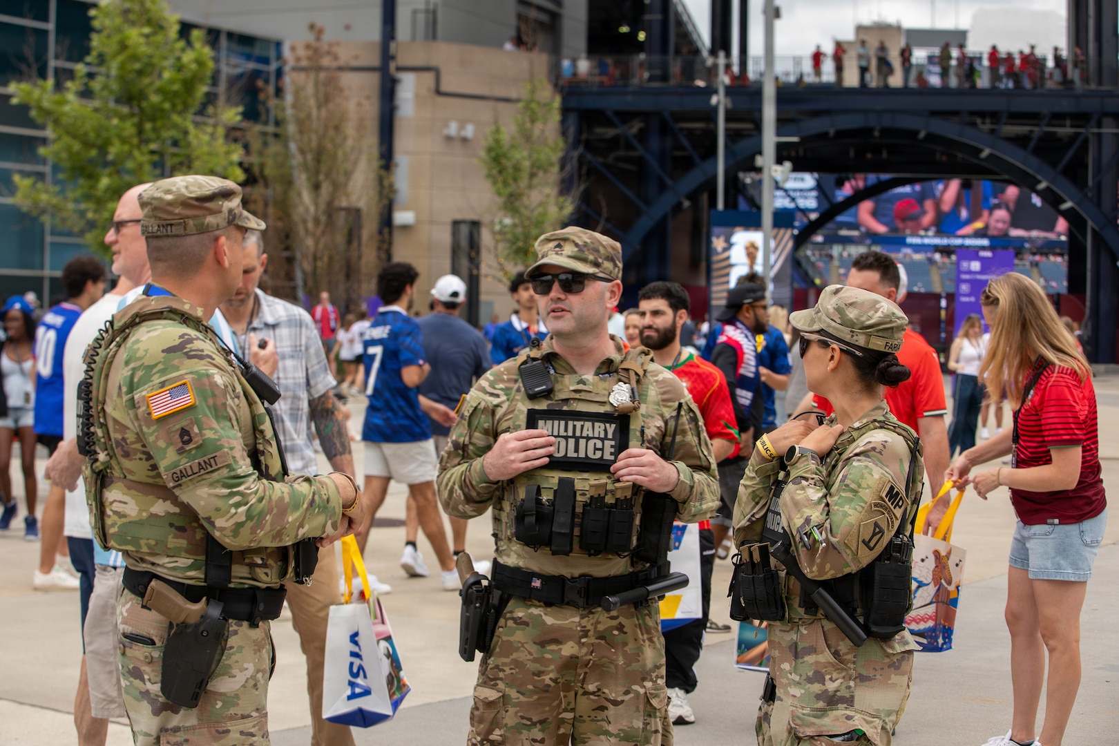 Soldiers from the 972nd Military Police Company and 211th Military Police Battalion, Massachusetts National Guard, provide security at an entrance area at Boston Stadium before a FIFA World Cup game, June 26, 2026.