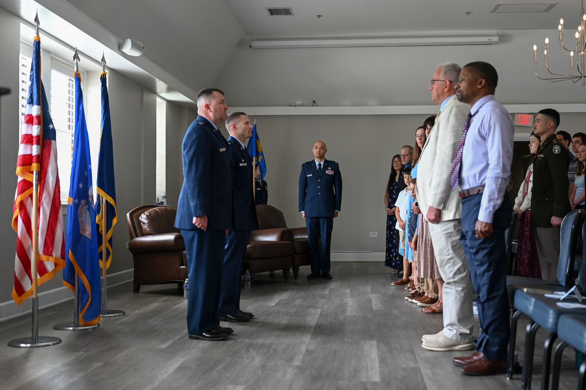 Airmen and guest stand during the Air Combat Command Operations Analysis Squadron (OAS) change of command ceremony.