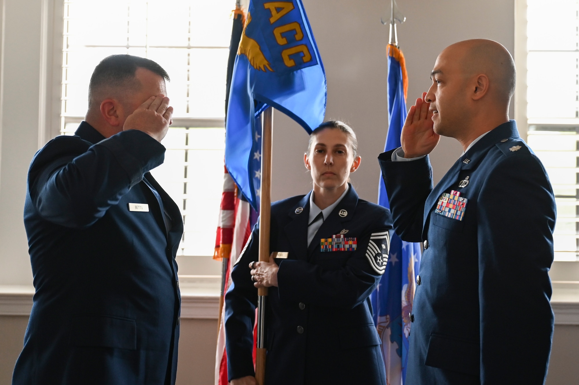 U.S. Air Force Lt. Col. Andrew Atkinson, renders a salute after assuming command of the Air Combat Command Operations Analysis Squadron.