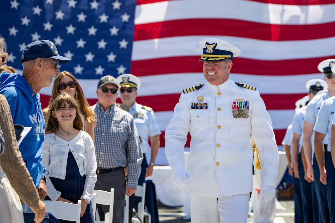U.S. Coast Guard Capt. James O’Mara, arrives to the change-of-command ceremony aboard Coast Guard Cutter Munro (WMSL 755) in San Diego, June 26, 2026. O’Mara led Munro through several notable missions, such as the the largest single maritime drug seizure in two decades, as well as the longest non-compliant vessel pursuit in Coast Guard history. (U.S. Coast Guard photo by Petty Officer 3rd Class Chris Sappey)