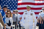 U.S. Coast Guard Capt. James O’Mara, arrives to the change-of-command ceremony aboard Coast Guard Cutter Munro (WMSL 755) in San Diego, June 26, 2026. O’Mara led Munro through several notable missions, such as the the largest single maritime drug seizure in two decades, as well as the longest non-compliant vessel pursuit in Coast Guard history. (U.S. Coast Guard photo by Petty Officer 3rd Class Chris Sappey)