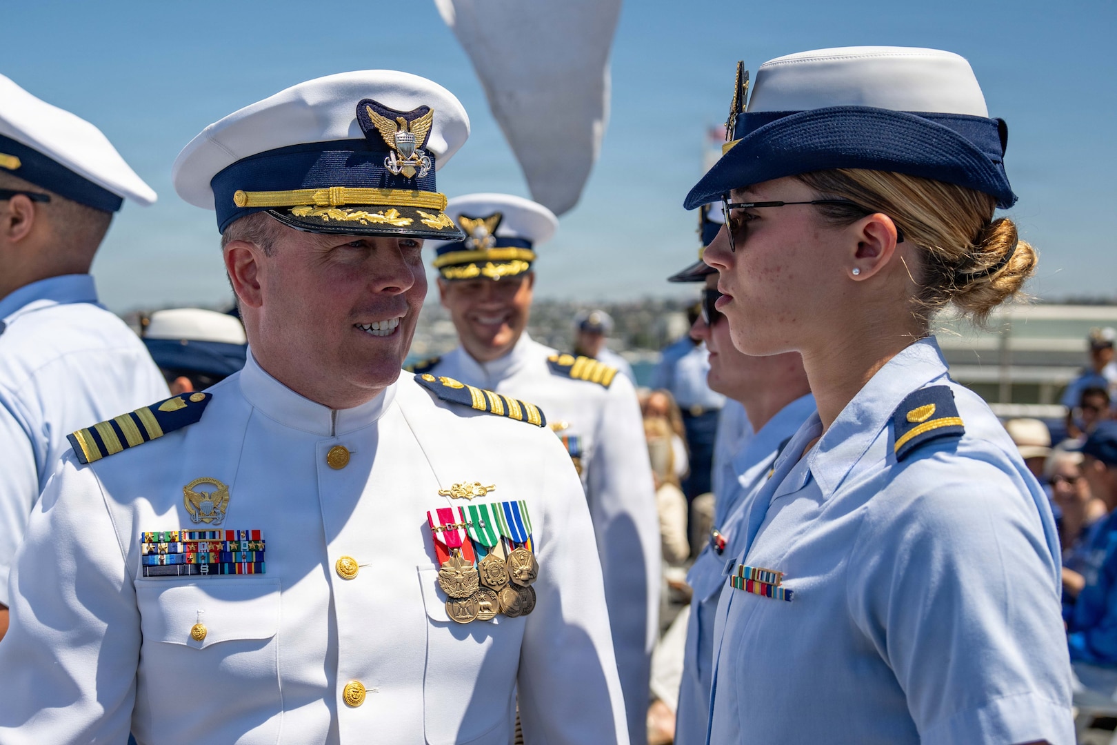 U.S. Coast Guard Capt. James O’Mara inspects his crew during his change-of-command ceremony aboard the Coast Guard Cutter Munro (WMSL 755) in San Diego, June 26, 2026. A inspection is traditionally performed by the oncoming and offing commanding officers together in order to verify the orderliness of the crew before relief. (U.S. Coast Guard photo by Petty Officer 3rd Class Chris Sappey)