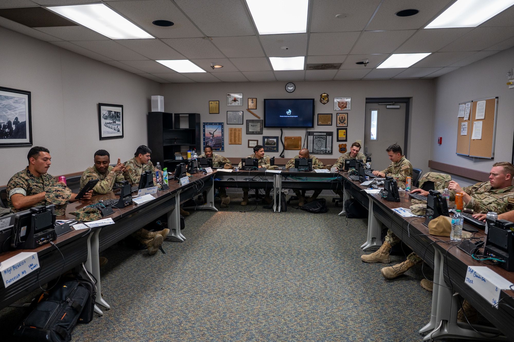 U.S. service members assigned to the Air Force Combat Ammunition Center Class 26-006 sit in a classroom at Beale Air Force Base, California, June 11, 2026.