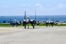 A U.S. Air Force F-15EX Eagle II and F-15E Strike Eagles assigned to 85th Test and Evaluation Squadron, Eglin Air Force Base, Florida, land at Kadena Air Base, Japan, June 29, 2026.
