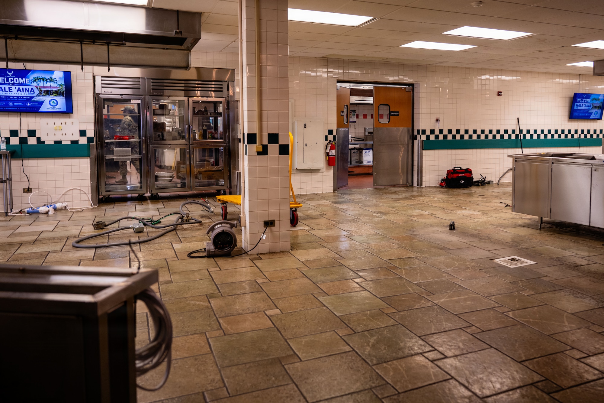 Interior view of the Hale ʻAina Dining Facility shows an empty serving area prior to renovation work at Joint Base Pearl Harbor-Hickam, Hawaii, June 17, 2026. The renovation project includes updates to serving line layouts, lighting, customer flow and food safety equipment to improve dining operations and service efficiency. (U.S. Air Force photo by Staff Sgt. Mark Sulaica)